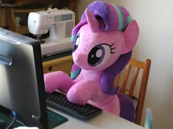 Size: 1199x899 | Tagged: safe, artist:nekokevin, imported from derpibooru, starlight glimmer, pony, unicorn, series:nekokevin's glimmy, computer, cute, female, glimmerbetes, irl, keyboard, life size, mare, photo, plushie, sewing machine, smiling, solo, vulgar description