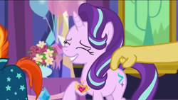 Size: 1136x640 | Tagged: safe, imported from derpibooru, discord, starlight glimmer, sunburst, celestial advice, season 7, balloon, big smile, equestrian pink heart of courage, eyes closed, flower, happy, paws, tail, tapping