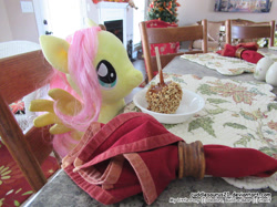 Size: 1555x1166 | Tagged: safe, artist:cuddlesaurus21, imported from derpibooru, fluttershy, pegasus, pony, caramel apple (food), dining table, irl, napkin, photo, plate, plushie, sitting, smiling, solo