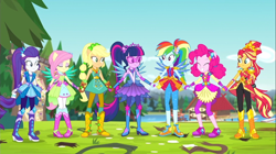 Size: 1100x618 | Tagged: safe, imported from derpibooru, screencap, applejack, fluttershy, pinkie pie, rainbow dash, rarity, sci-twi, sunset shimmer, twilight sparkle, equestria girls, legend of everfree, boots, clothes, crystal guardian, crystal wings, eyes closed, female, glasses, gloves, high heel boots, holding hands, legs, pants, ponied up, rubber boots, scenery, shoes, sneakers, super ponied up, wings