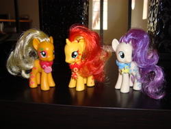 Size: 3072x2304 | Tagged: safe, artist:faerie-starv, imported from derpibooru, applejack, bon bon, sunset shimmer, pony, unicorn, cutie mark magic, irl, photo, toy