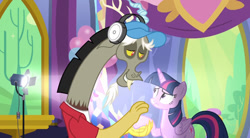 Size: 684x378 | Tagged: safe, imported from derpibooru, screencap, discord, twilight sparkle, alicorn, pony, celestial advice, clothes, hat, headphones, light, stage light, twilight sparkle (alicorn), twilight's castle