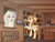 Size: 1024x768 | Tagged: safe, artist:novaintellus, imported from derpibooru, oc, oc only, oc:autumn topaz, oc:pastel tanzanite, pegasus, pony, unicorn, book, bookshelf, duo, duster, mouth hold