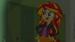 Size: 300x168 | Tagged: safe, edit, edited screencap, imported from derpibooru, screencap, sunset shimmer, comic:a new change, equestria girls, equestria girls (movie), clothes, female, hand on hip, jacket, leather jacket, lockers, pregnant, pregnant edit, skirt, solo