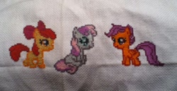 Size: 960x497 | Tagged: safe, imported from derpibooru, apple bloom, scootaloo, sweetie belle, pony, cross stitch, cutie mark crusaders