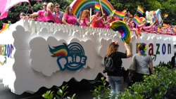 Size: 1200x675 | Tagged: safe, imported from derpibooru, rainbow dash, human, amazon.com, gay pride, irl, irl human, lgbt, murica, photo, pride, pride parade, united states