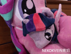 Size: 600x450 | Tagged: safe, artist:nekokevin, imported from derpibooru, starlight glimmer, twilight sparkle, alicorn, pony, unicorn, series:nekokevin's glimmy, 4de, adorable distress, animated, clothes, cuddling, cute, daaaaaaaaaaaw, female, gif, glimmerbetes, hape, head shake, hug, irl, mare, nekokevin is trying to murder us, non-consensual cuddling, photo, plushie, size difference, socks, starlight's little twibird, stop motion, striped socks, struggle snuggle, the weak should fear the strong, twiabetes, twilight sparkle (alicorn)