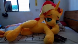 Size: 960x546 | Tagged: safe, artist:ec31314, artist:nekokevin, imported from derpibooru, sunset shimmer, pony, unicorn, draw me like one of your french girls, irl, lidded eyes, life size, on side, photo, plushie, side