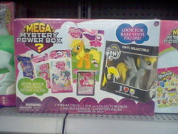 Size: 640x480 | Tagged: safe, imported from derpibooru, applejack, derpy hooves, pinkie pie, princess celestia, pony, box, irl, mega mystery power box, merchandise, photo, trading card, trading card game, vinyl collectible
