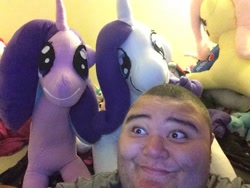 Size: 720x540 | Tagged: safe, artist:ponylover88, imported from derpibooru, fluttershy, rarity, starlight glimmer, human, bedroom, e for effort, huge, irl, irl human, livestream photoshot, pepsi, photo, plushie, soda, wat