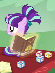 Size: 357x472 | Tagged: safe, imported from derpibooru, screencap, starlight glimmer, unicorn, the crystalling, the cutie re-mark, blocks, book, cropped, cute, female, filly, filly starlight glimmer, glimmerbetes, pigtails, younger