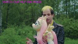 Size: 640x360 | Tagged: safe, imported from derpibooru, fluttershy, human, brony, irl, irl human, photo, plushie, russia, трудно быть брони