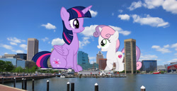 Size: 2925x1500 | Tagged: safe, artist:reginault, artist:slb94, artist:theotterpony, imported from derpibooru, sweetie belle, twilight sparkle, alicorn, pony, baltimare, baltimore, city, giant pony, highrise ponies, irl, macro, maryland, mega twilight sparkle, open mouth, photo, ponies in real life, raised hoof, sitting, story in the source, twilight sparkle (alicorn)