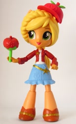 Size: 1147x1859 | Tagged: safe, artist:whatthehell!?, imported from derpibooru, applejack, equestria girls, candy, clothes, doll, equestria girls minis, food, hat, irl, lollipop, merchandise, photo, shoes, skirt, theme park, toy