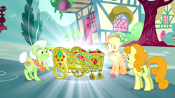 Size: 1440x807 | Tagged: safe, imported from derpibooru, screencap, applejack, carrot top, golden harvest, granny smith, earth pony, pony, inspiration manifestation, apple, apple cart, bedazzled, female, food, gem, gold, mare, raised hoof, shiny, surprised, trio