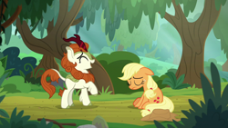 Size: 1280x720 | Tagged: safe, imported from derpibooru, screencap, applejack, autumn blaze, earth pony, kirin, pony, sounds of silence, duo, eyes closed, female, floppy ears, forest, laughing, mare, raised hoof, sitting