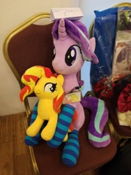 Size: 3120x4160 | Tagged: safe, imported from derpibooru, starlight glimmer, sunset shimmer, unicorn, chair, clothes, cute, female, irl, kelly sheridan, photo, plushie, socks, striped socks