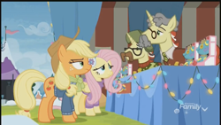 Size: 2208x1242 | Tagged: safe, imported from derpibooru, screencap, applejack, flam, flim, fluttershy, holly the hearths warmer doll, earth pony, pegasus, pony, unicorn, best gift ever, applejack is not amused, brothers, discovery family logo, disguise, female, flim flam brothers, hat, male, mare, stallion, twins, unamused