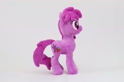 Size: 3000x2000 | Tagged: safe, artist:nekokevin, imported from derpibooru, berry punch, berryshine, earth pony, pony, female, irl, mare, photo, plushie, side view, simple background, smiling, solo, white background