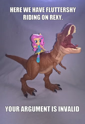 Size: 1833x2683 | Tagged: safe, artist:edhelistar, derpibooru exclusive, imported from derpibooru, fluttershy, dinosaur, tyrannosaurus rex, equestria girls, badass, crossover, doll, equestria girls minis, fall formal outfits, flutterbadass, humans riding dinosaurs, image macro, irl, jurassic park, jurassic world, knee-high boots, meme, photo, ponied up, rexy, riding, roar, text, toy, your argument is invalid