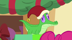 Size: 1280x720 | Tagged: safe, imported from derpibooru, screencap, gummy, best gift ever, christmas, hat, holiday, santa hat