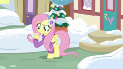 Size: 1280x720 | Tagged: safe, imported from derpibooru, screencap, fluttershy, pegasus, pony, best gift ever, clothes, earmuffs, female, mare, snow, solo, sweater