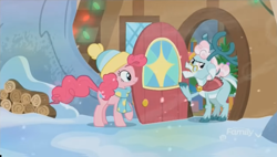 Size: 1348x768 | Tagged: safe, imported from derpibooru, screencap, aurora the reindeer, pinkie pie, deer, earth pony, pony, reindeer, best gift ever, clothes, cloven hooves, doe, door, duo, female, hat, house, log, logs, mare, raised hoof, scarf, shawl, snow, windy