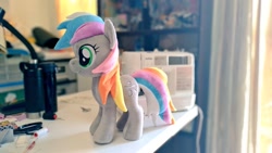 Size: 1024x577 | Tagged: safe, artist:nekokevin, imported from derpibooru, oc, oc only, oc:rokuchan, earth pony, pony, female, irl, mare, photo, plushie, sewing machine, side view, smiling, solo