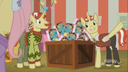 Size: 1352x758 | Tagged: safe, imported from derpibooru, screencap, flam, flim, fluttershy, holly the hearths warmer doll, best gift ever, box, crate, discovery family logo, flim flam brothers