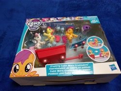 Size: 4032x3024 | Tagged: safe, imported from derpibooru, apple bloom, scootaloo, sweetie belle, pony, box, cutie mark crusaders, guardians of harmony, helmet, irl, photo, pony pulls the wagon, scooter, skates, toy, wagon