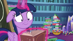 Size: 1280x720 | Tagged: safe, imported from derpibooru, screencap, twilight sparkle, alicorn, pony, best gift ever, book, bookshelf, candy, candy cane, chalkboard, female, floppy ears, food, shocked, solo, twilight sparkle (alicorn)