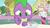 Size: 1280x720 | Tagged: safe, imported from derpibooru, screencap, spike, dragon, season 7, triple threat, claws, disappointed, male, ponyville, solo, table, uneasy, upset