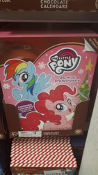 Size: 4608x2592 | Tagged: safe, imported from derpibooru, pinkie pie, rainbow dash, earth pony, pegasus, pony, advent calendar, calendar, chocolate, christmas, christmas tree, food, holiday, irl, kinnerton, logo, official, photo, photography, snow, snowfall, tree