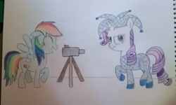 Size: 2962x1782 | Tagged: safe, artist:prinrue, imported from derpibooru, rainbow dash, rarity, camera, clothes, hat, jester, rarijester, traditional art, video camera