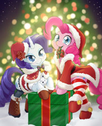 Size: 1080x1338 | Tagged: safe, artist:dstears, imported from derpibooru, pinkie pie, rarity, earth pony, pony, unicorn, bell, christmas, christmas tree, clothes, female, hat, holiday, mare, mouth hold, present, santa hat, smiling, socks, striped socks, tree