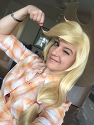 Size: 768x1024 | Tagged: safe, imported from derpibooru, applejack, human, applejack's hat, beautiful, blonde, clothes, cosplay, costume, cowboy hat, hat, irl, irl human, one eye closed, photo, smiling, wink