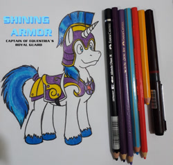 Size: 1300x1236 | Tagged: safe, artist:dingopatagonico, imported from derpibooru, shining armor, pony, unicorn, armor, caption, colored pencil drawing, male, pen, pencil, photo, solo, stallion, traditional art