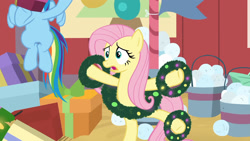 Size: 1920x1080 | Tagged: safe, imported from derpibooru, screencap, fluttershy, rainbow dash, pegasus, pony, hearth's warming shorts, the great escape room, bucket, solo focus, standing, standing on one leg, wreath