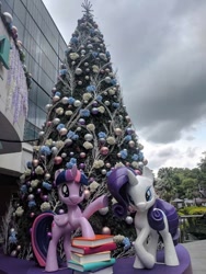 Size: 720x960 | Tagged: safe, imported from derpibooru, rarity, twilight sparkle, alicorn, pony, book, christmas, christmas tree, holiday, irl, photo, singapore, statue, tree, twilight sparkle (alicorn)