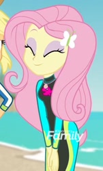 Size: 1265x2100 | Tagged: safe, imported from derpibooru, screencap, applejack, fluttershy, equestria girls, equestria girls series, forgotten friendship, beach, clothes, cropped, cute, eyes closed, female, fluttershy's wetsuit, shyabetes, smiling, solo, swimsuit, wetsuit