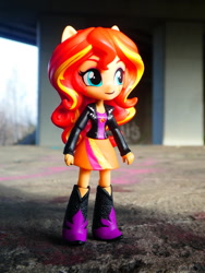 Size: 1024x1365 | Tagged: safe, artist:artofmagicpoland, imported from derpibooru, sunset shimmer, equestria girls, boots, clothes, doll, equestria girls minis, irl, jacket, photo, ponied up, shoes, skirt, toy