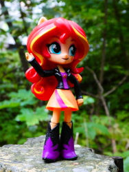 Size: 3672x4896 | Tagged: safe, artist:artofmagicpoland, imported from derpibooru, sunset shimmer, equestria girls, boots, clothes, doll, equestria girls minis, forest, irl, jacket, photo, shoes, skirt, toy