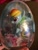 Size: 360x480 | Tagged: safe, imported from derpibooru, rainbow dash, pony, figure, hand, irl, jelly bean, photo, sitting, solo, toy