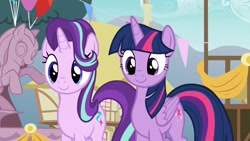 Size: 1200x675 | Tagged: safe, imported from derpibooru, screencap, starlight glimmer, twilight sparkle, alicorn, pony, unicorn, triple threat, duo, duo female, female, smiling, twilight sparkle (alicorn)