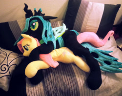 Size: 1715x1350 | Tagged: safe, artist:agatrix, artist:blackwater627, imported from derpibooru, fluttershy, queen chrysalis, changeling, pegasus, pony, bed, chrysashy, cuddling, female, irl, lesbian, lying down, on side, photo, plushie, shipping, side, spooning