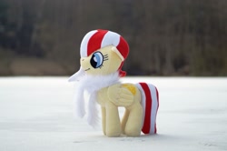 Size: 2046x1362 | Tagged: safe, imported from derpibooru, oc, pony, clothes, cold, cozzy, female, happy, ice, irl, lake, mare, nature, outdoors, photo, photography, plushie, scarf, snow, solo, warm, winter