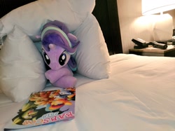 Size: 1024x767 | Tagged: safe, artist:nekokevin, imported from derpibooru, starlight glimmer, pony, unicorn, series:nekokevin's glimmy, babscon, bed, bedroom, crossed hooves, cute, female, glimmerbetes, irl, lamp, looking down, lying down, mare, photo, pillow, plushie, prone, solo