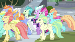 Size: 1280x720 | Tagged: safe, imported from derpibooru, screencap, aestuarium, flush typhoon, sky beak, sundown horizon, twilight sparkle, alicorn, classical hippogriff, hippogriff, pony, surf and/or turf, background hippogriff, crowd, cute, female, jewelry, male, mare, necklace, raised hoof, raised leg, size difference, smiling, twiabetes, twilight sparkle (alicorn), walking