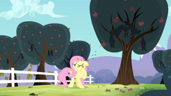 Size: 1280x720 | Tagged: safe, imported from derpibooru, screencap, fluttershy, bat, fruit bat, pegasus, pony, vampire fruit bat, bats!, apple orchard, apple tree, bullet seed, female, fence, mare, one eye closed, red eyes, shielding face, spread wings, tree, upside down, wings