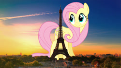 Size: 2560x1440 | Tagged: safe, artist:dashiesparkle, artist:theotterpony, imported from derpibooru, fluttershy, pegasus, pony, eiffel tower, female, france, giant pony, highrise ponies, irl, macro, mare, paris, photo, ponies in real life, solo, story in the source